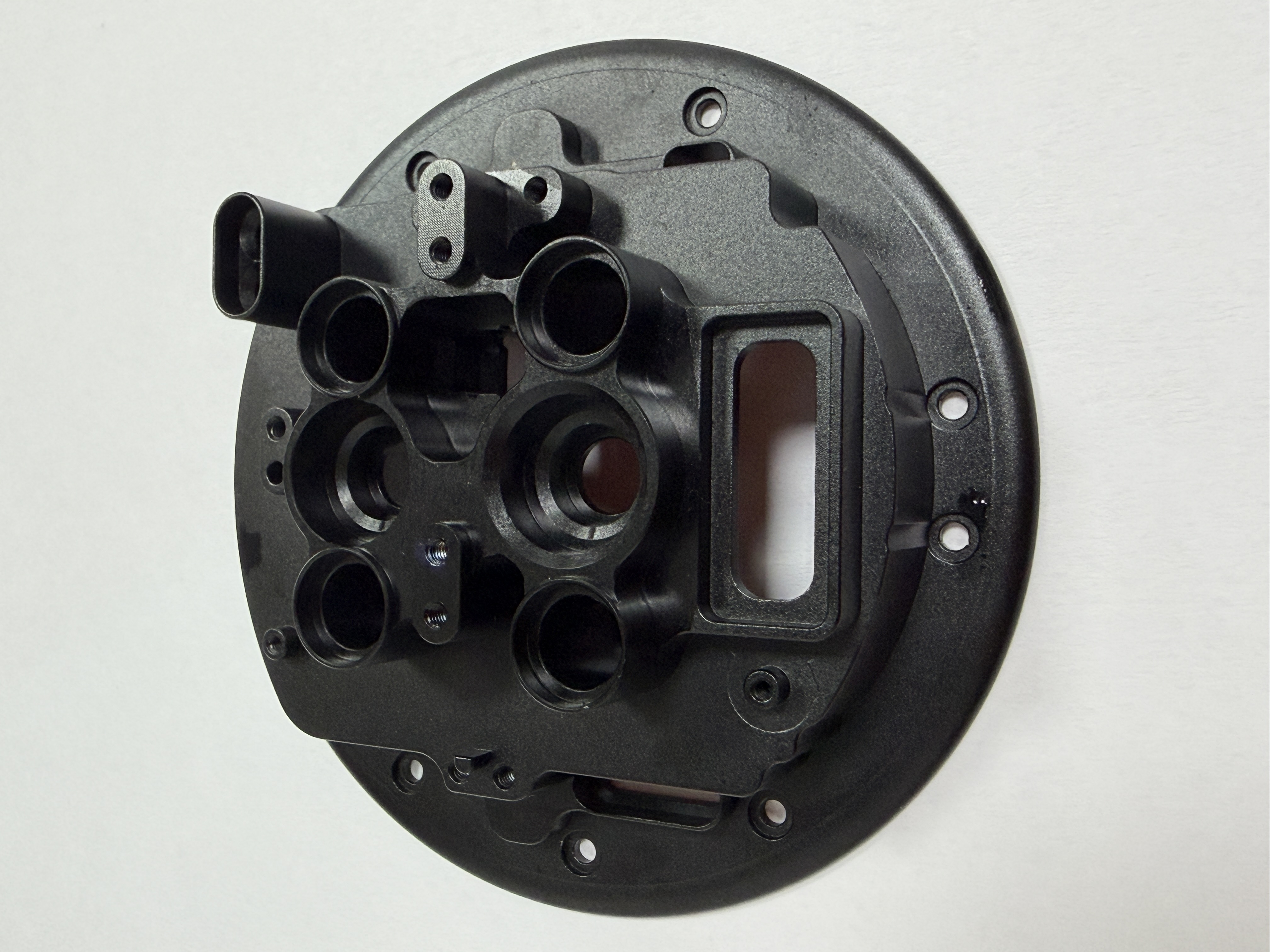Transparent machined block with threaded holes